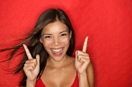 Happy energetic woman on red